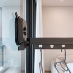 Close-up of the suction mount sealed flat on a glass door