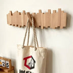 Wall-mounted wooden coat rack