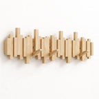 Wall-mounted wooden coat rack