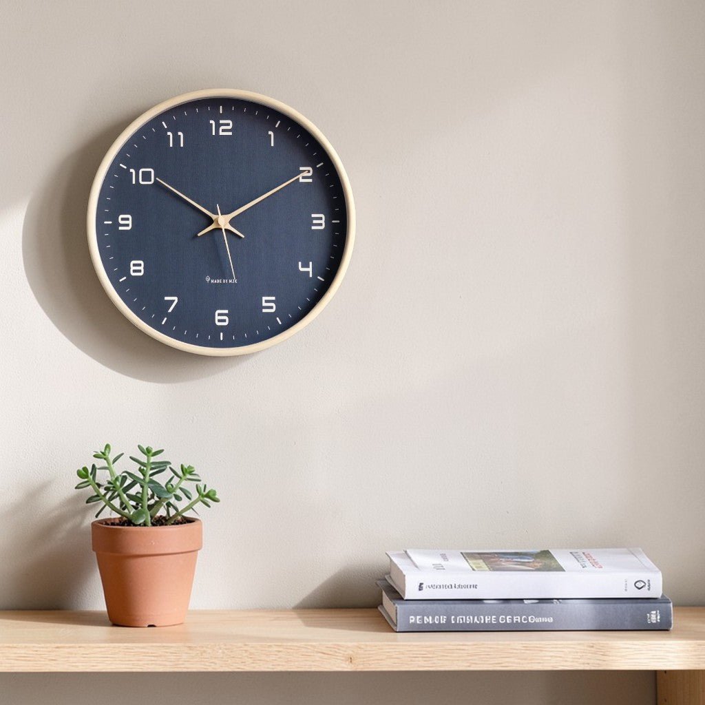 Wooden wall clock in blue above a shelf
